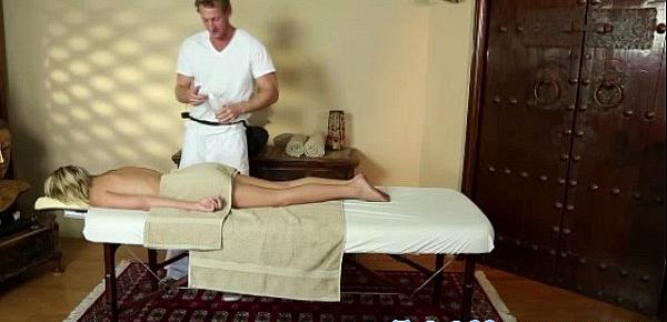  Massage babe unaware of masseurs cock